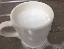 image of soapsuds in a coffee cup