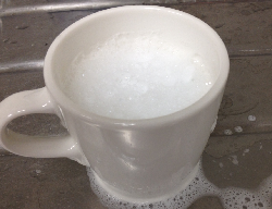 soapsuds in a coffee cup